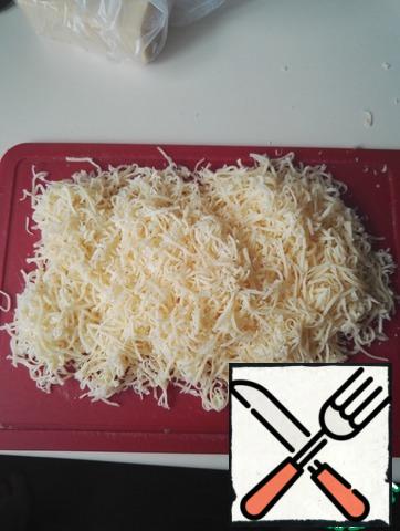 Cheese to grate on a small grater.