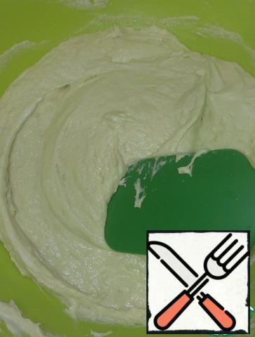 Sift flour, baking powder, then add eggs, sour cream and melted butter. Knead the dough with a mixer or spatula, add a pinch of salt.