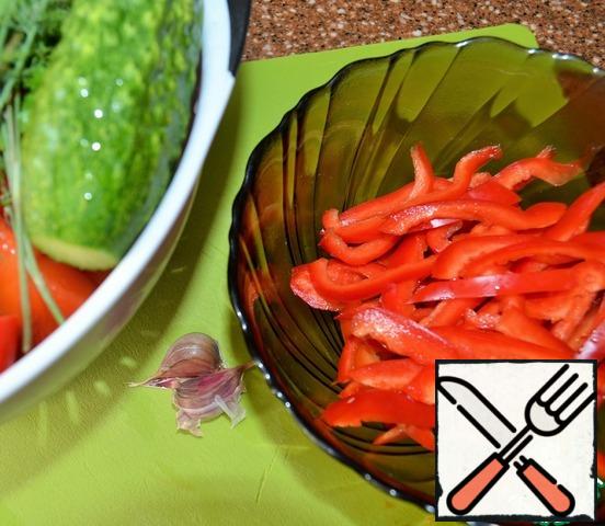 Cut the peppers into long thin strips.