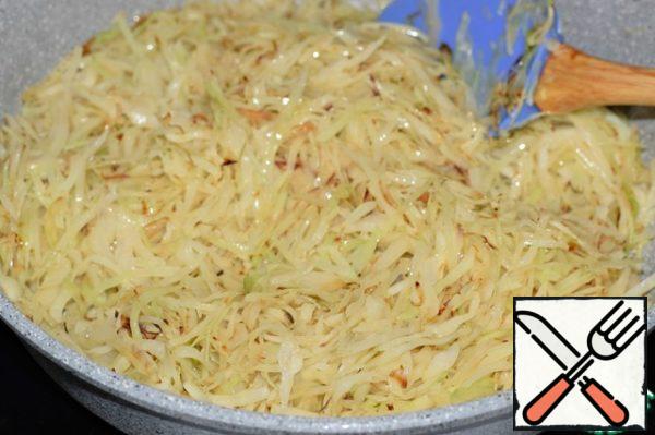 Cabbage cut into strips.
Ghee (or regular butter) oil well in the frying pan and put it in the cabbage. Fry cabbage until Golden brown on high heat. Stir to avoid burning.
