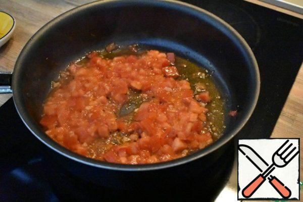 Press finely chopped tomatoes, simmer until soft for about 7-8 minutes.