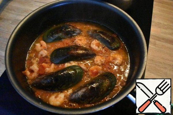 Add mussels, as in the photo.
