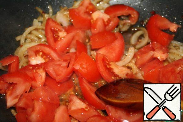 Then add the tomatoes and fry for about 6 minutes.