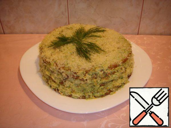 Garnish with grated cheese.
Leave overnight in the refrigerator to soak the cakes.