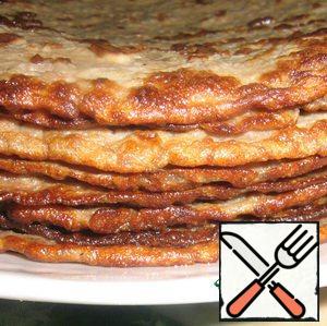Fry the pancakes on both sides and stack them on top of each other.