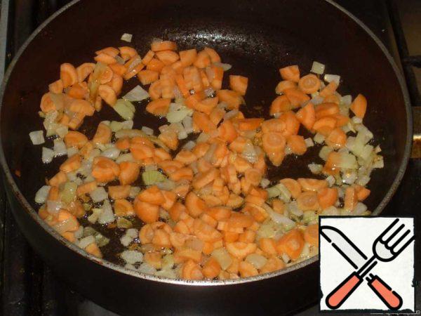 Add the carrots and fry all together until soft.