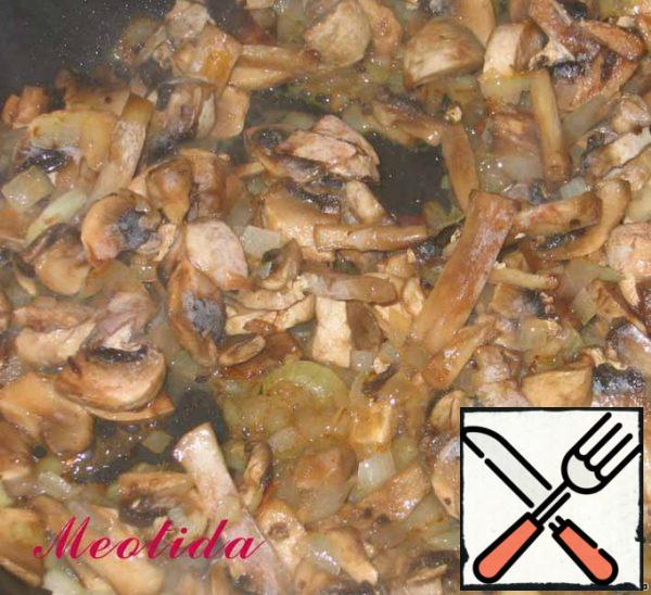 Fry the mushrooms with onions until golden brown, add salt and pepper to taste.

