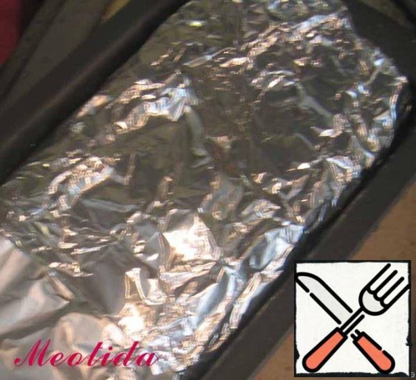 Wrap the edges of the form, tightly press the foil and send it to the preheated 200C oven for an hour.
After that, turn off the oven, cut the foil and leave the terrine for some time in the oven to brown it (cooking time, of course, approximate, because all the ovens work differently).