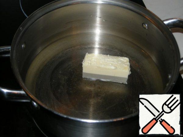 Place the water and butter in a saucepan and bring to a boil.