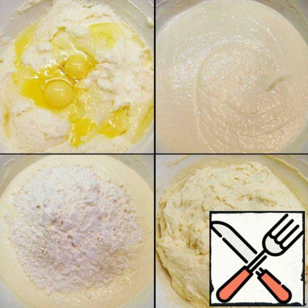 Added the eggs, and again everything is thoroughly mixed. Then added vanilla, soda and flour. The dough is stirred and divided into four equal parts.