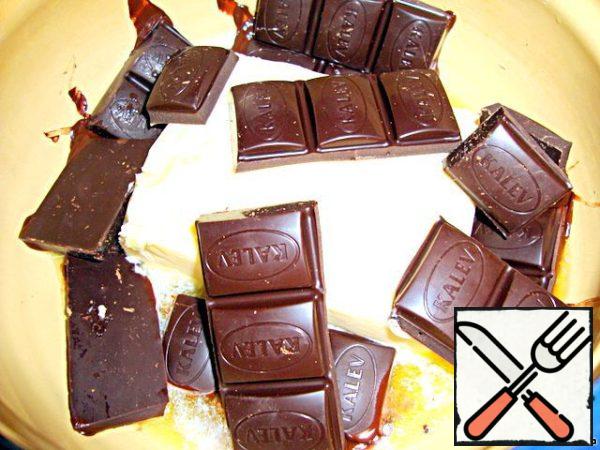 In a water bath, dissolve the chocolate and butter.
