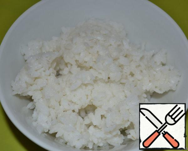 Cook rice and eggs. Finely chop the eggs. That's it, put them aside, add them to the beans at the end.
