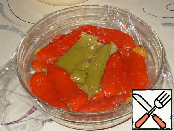 Spread a layer of red peppers.