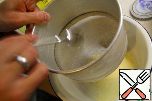 Rub the corn flour through a sieve.
