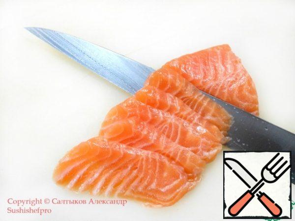 With a sharp knife cut off from him the right amount of fish pieces.