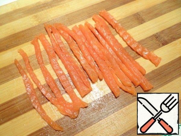 Salmon cut into thin strips.