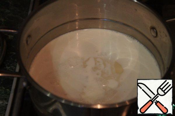 Return the soup back to the pan, dilute with hot milk.
