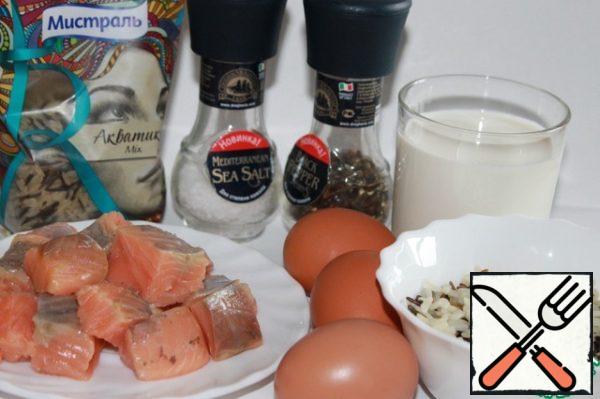 Rice, eggs, cream and salmon fillet punch in a blender. Add salt and ground black pepper to taste. Stir well.