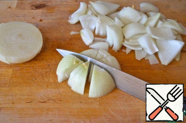 Cut the onion in half lengthwise, and then each half into 6 slices.

