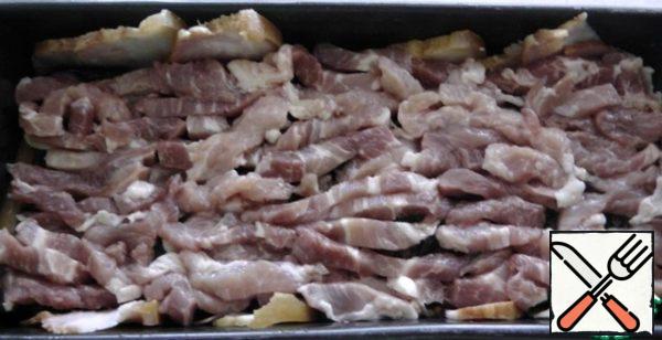 Next layer of pork slices.