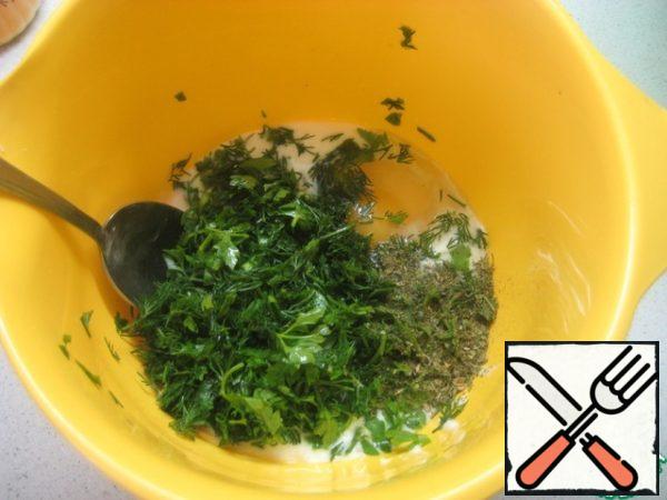 Mix kefir, egg, sugar, chopped parsley and dill (about 2 tablespoons left), add spices to taste.