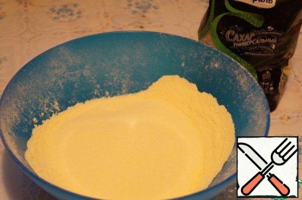 Sift flour (both types) and baking powder.