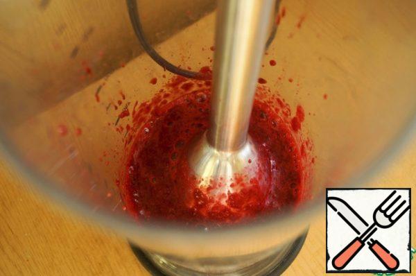 Prepare the sauce. To do this, whisk the cherries with a blender with wine and powdered sugar.
For children, whisk the cherries with powdered sugar.
Pour the sauce into a saucepan. Transfer the terrine from the mold to a dish, remove the film and cut into portions. If the terrine was prepared without a film, then to remove it, you can warm up the sides and bottom of the dryer. Serve the terrine, sprinkling with sauce. Enjoy your meal!