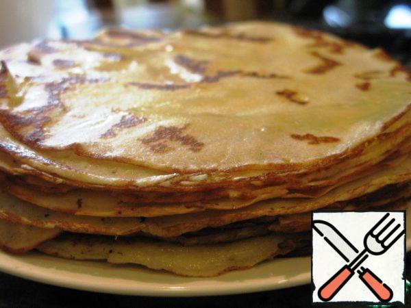 Pancake batter.
Beat eggs, sift flour, add sugar, salt, pour milk. Mix everything with a blender. Add melted butter. Mix again.
Bake pancakes in a pan with the addition of oil.
Pancakes grease with butter. I made 20 pancakes.