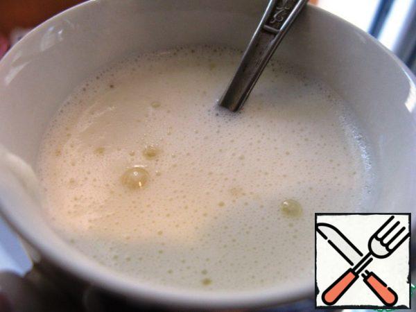 Soak gelatin in cold water for 10 minutes.
Then dissolve in warm milk.