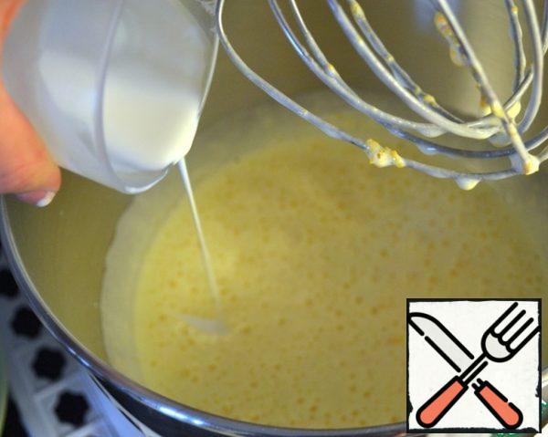Pour in the cream, add salt and continue whipping for another 1-2 minutes.
