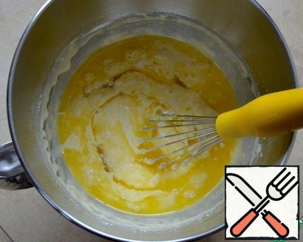 Add the pre-melted but not hot butter and mix thoroughly.