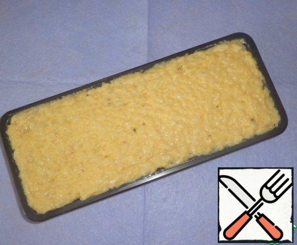 Put the filling in the middle. Cover 1/3 of the main mass.
Cover the mold with foil and bake in the oven for 45-50 minutes at 180-200 degrees.
Allow the terrine to cool, and then remove from the mold.
Before serving, cut into small pieces.