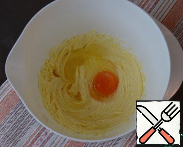 Add one egg at room temperature and beat well again.