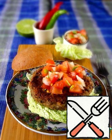Serve burgers with any salad leaves, tomato salsa and a slice of lime.