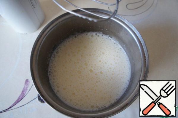 Flour stir in milk, pour into yolks, stir.