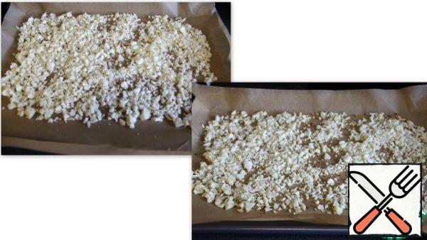 Place the chopped cauliflower on a baking sheet lined with parchment paper and place in a preheated 220C oven for 12-15 minutes.
