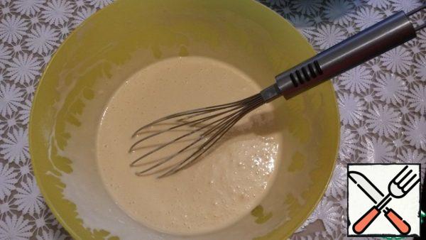 Take a bowl, beat three eggs.
Next, add sour cream and yogurt, whisk a little.
Add flour, salt,baking powder and mix until smooth. And leave for 7-8 minutes.