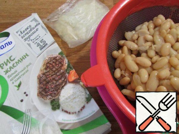 Open a can of canned beans, throw in a colander to drain the excess liquid.