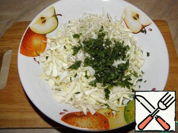 Finely chop the greens, add to the cabbage.

