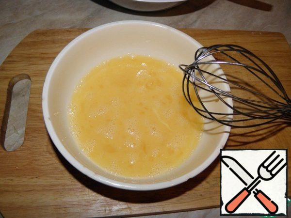 Salt the eggs and whisk.