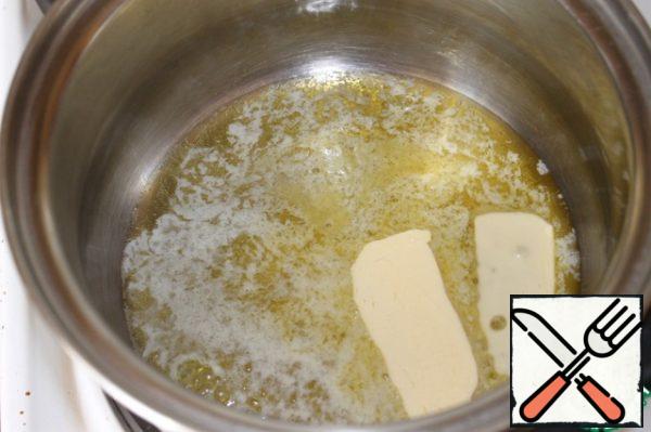 To start preparing the Bechamel sauce. I'll melt the butter in a pan.
