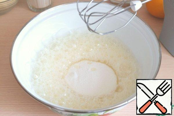 Separate the whites from the yolks. Beat the whites into foam. Add sugar beat again.