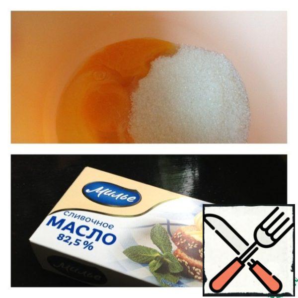 Melt the butter and cool to room temperature. Beat the eggs with sugar until fluffy.

