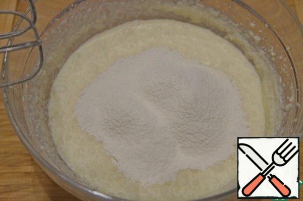 Sift flour with baking powder on top.