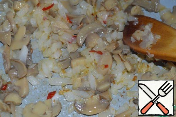 Add the chopped mushrooms. Fry for 5 minutes.
