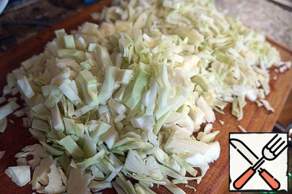 Cut cabbage into small cubes.
