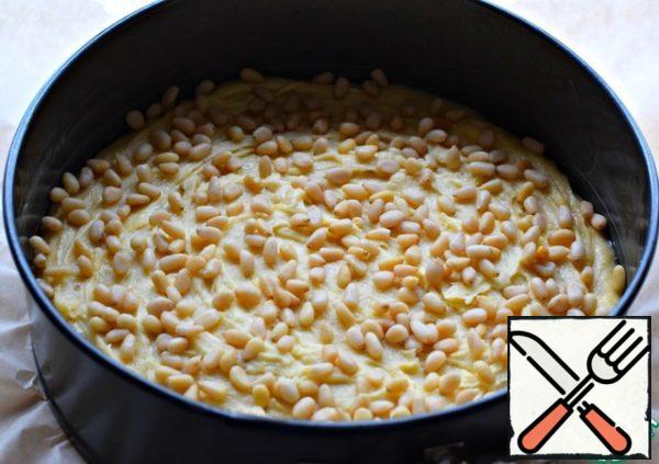 Put in a warm place for 10-15 minutes.
Put pine nuts on top.
