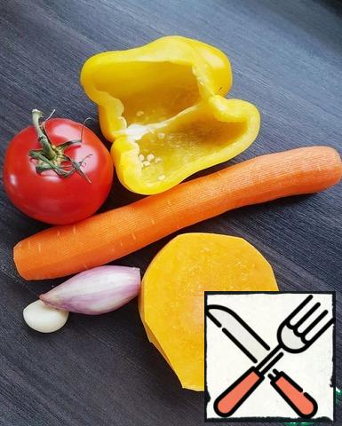 Wash vegetables and peel them.