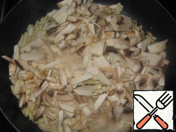 Add the mushrooms, cut into strips.
