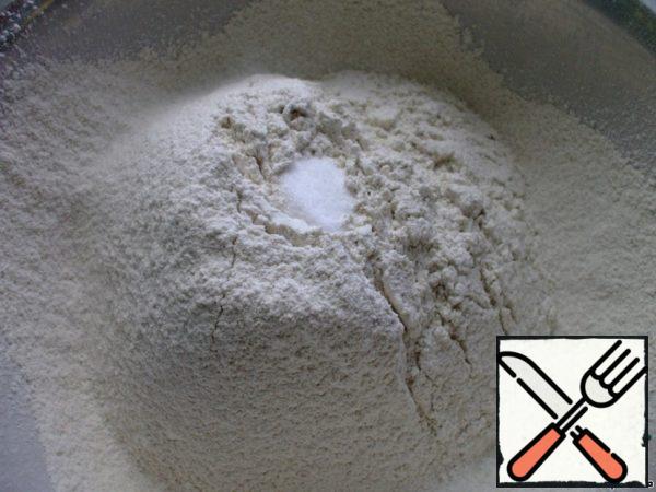 While the yeast is suitable, we're a mixture of rye and wheat flour add half tea spoon of salt. Stir.